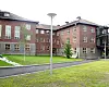 Figur 1: Deler av Meieriinstituttbygningen med kontorer og laboratoriedel til høyre og Forsøksmeieriet (nå «Matpiloten») til venstre.